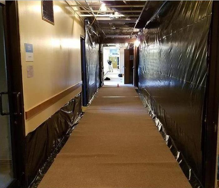 Corridor with containment on walls 